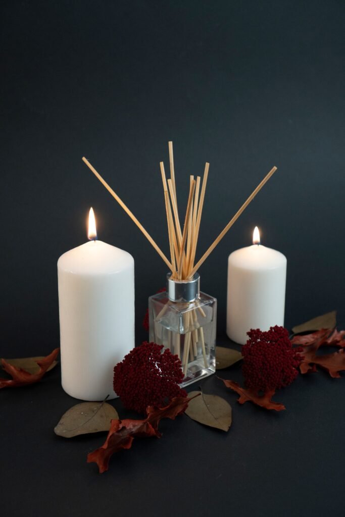 reed diffuser and candle for a relaxing living room