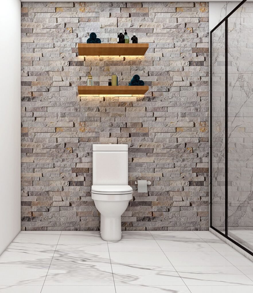 Bathroom shelves with storage items and lighting above the toilet